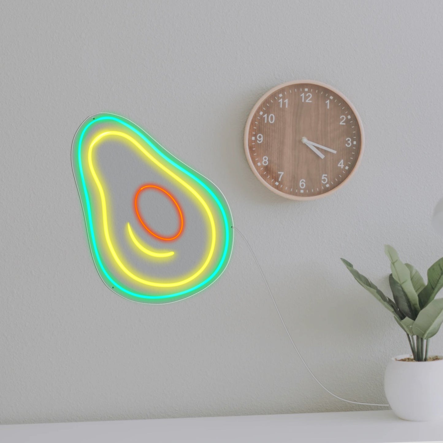 A glowing neon sign in the shape of an avocado, symbolizing Australia's love for this trendy fruit, perfect for adding a touch of Down Under charm to any space