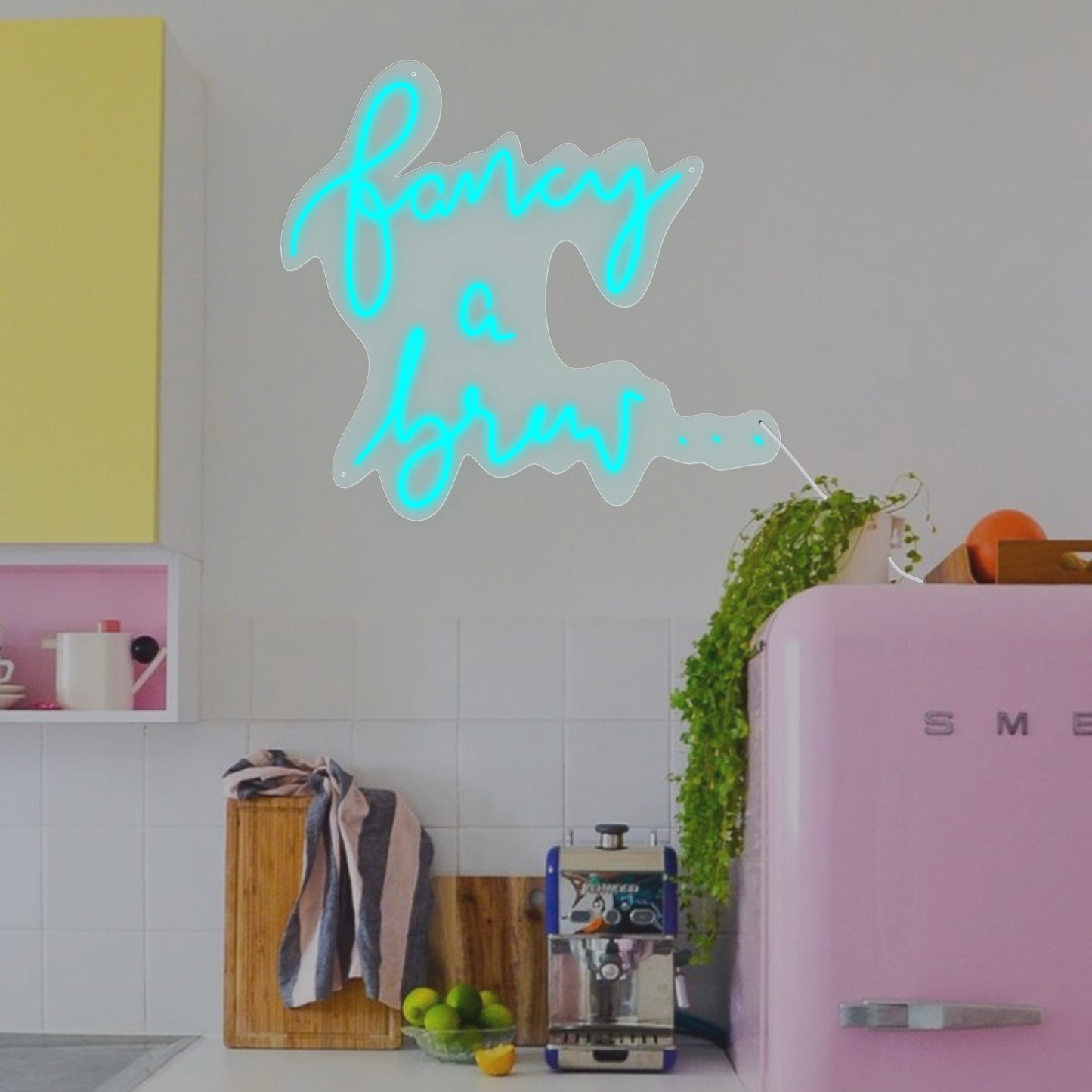 A vibrant 'Fancy a Brew..' Neon Sign, perfect for adding a playful charm to modern kitchens and embracing the kitsch trend