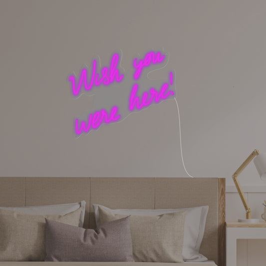 An adorable 'Wish You Were Here' Neon Sign, perfect for adding cuteness and heartfelt vibes to your space
