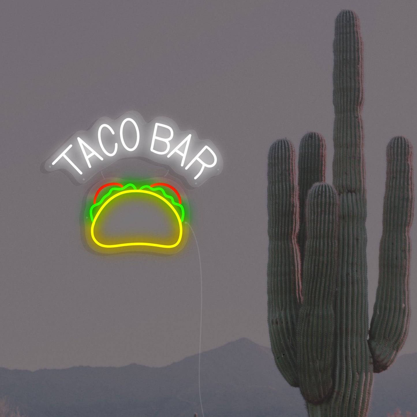 Taco bar sign as a neon sign showing a taco with tomato and lettuce leaves