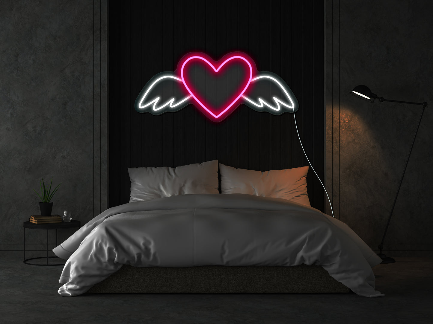 A pink neon sign of a heart with wings, illuminating a dimly lit room, perfect for romantic or love-themed decoration
